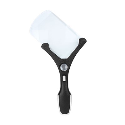 Rokā turams palielināmais stikls lasīšanai